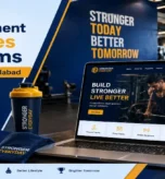 Laptop and tablet showing gym website design with shaker bottle and towel